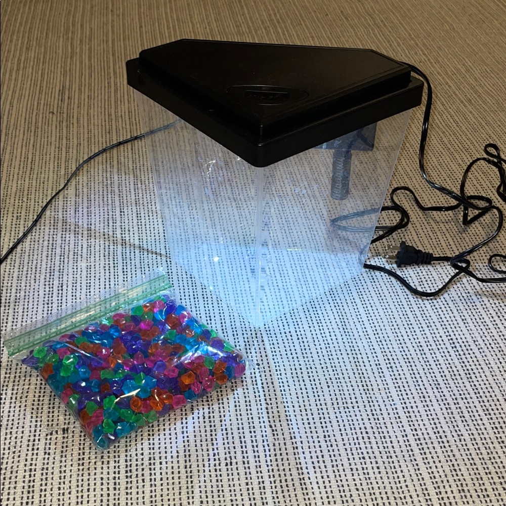 Small preowned Triangle Fish Tank with Colorful Pebbles